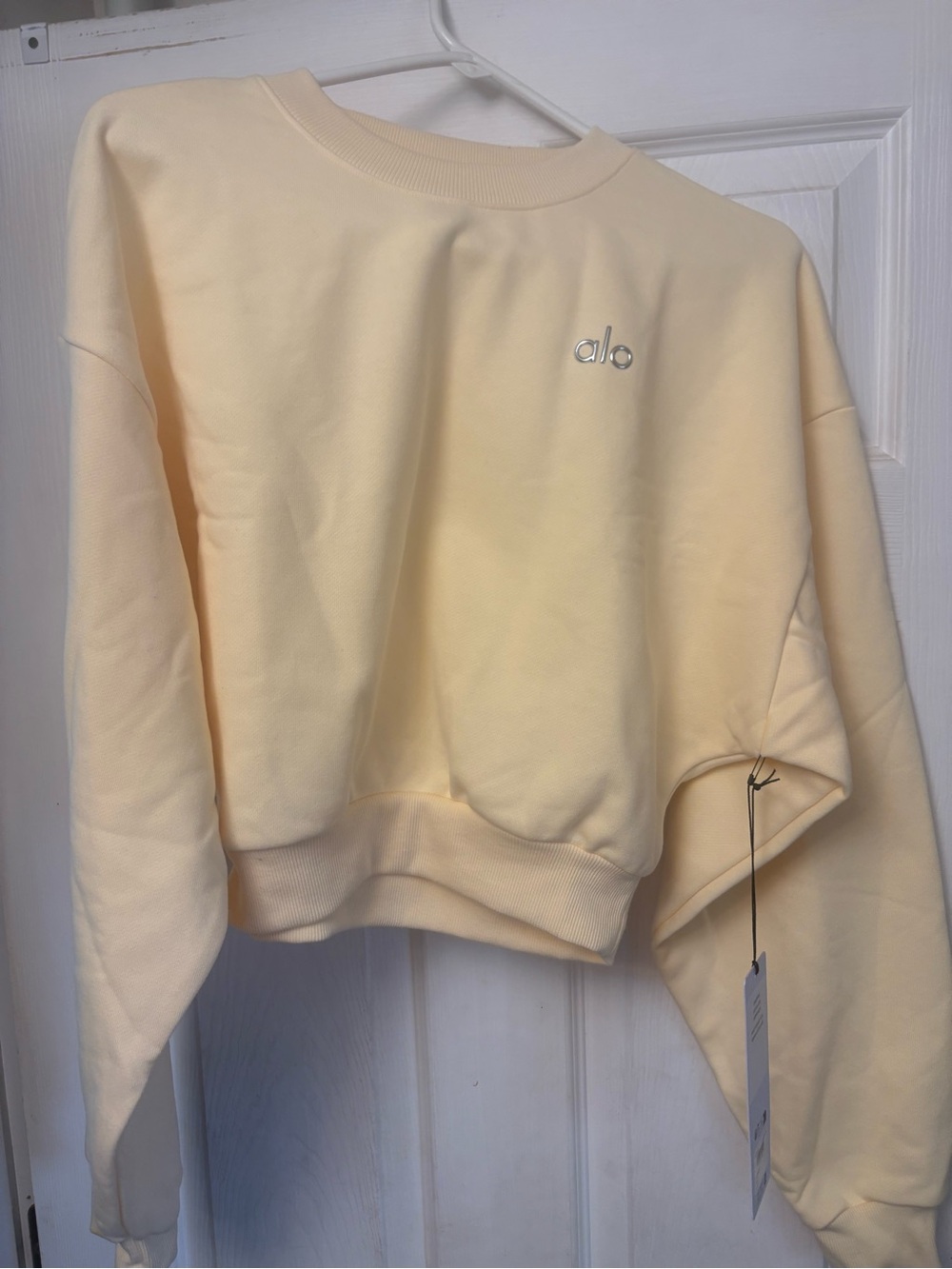 Alo Cropped Accolade Crewneck Sweatshirt in Soft Pale Yellow - Picture 3 of 7